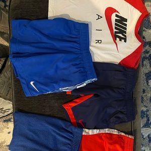 Lot of 5t Nike clothes.  shirt and 4 shorts